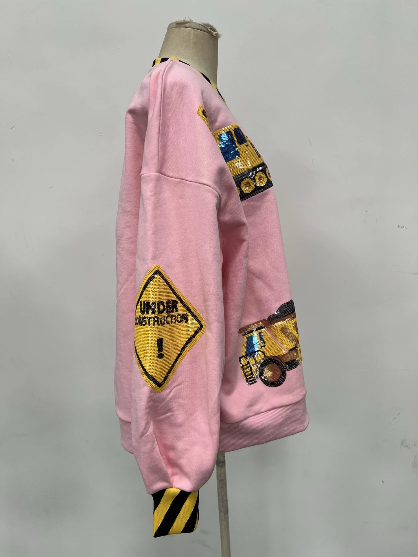 Pretty in pink construction sequin pullover