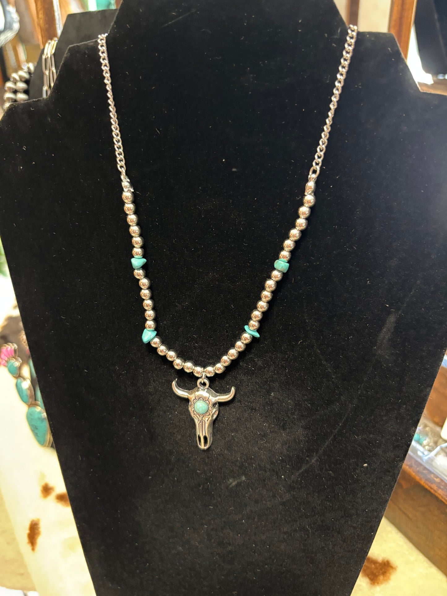 Steer with turquoise and beads