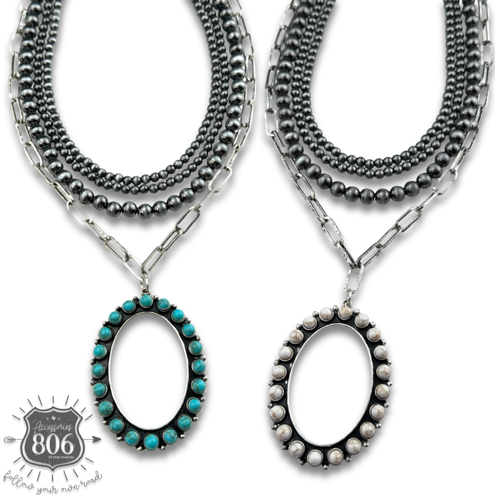 Burnished silver necklace, oval stone pendant