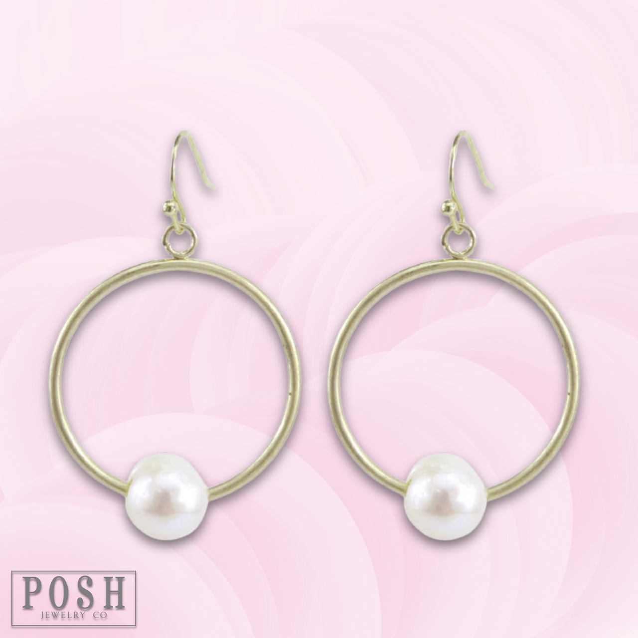 Gold circle earring with pearl charm
