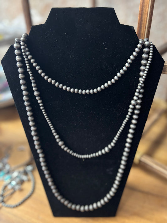 Triple strand beads