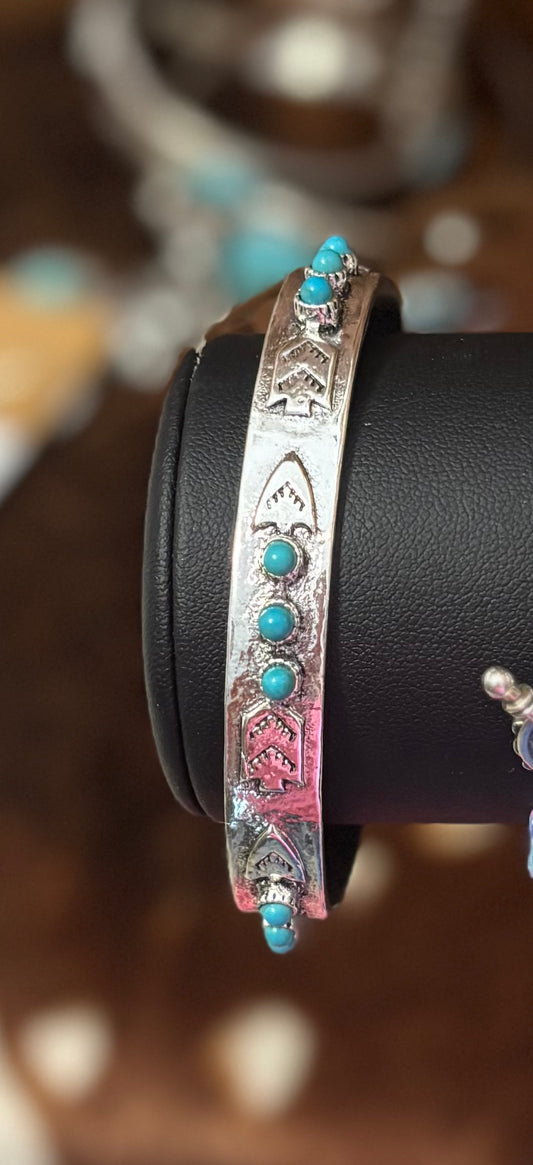 Turquoise arrow