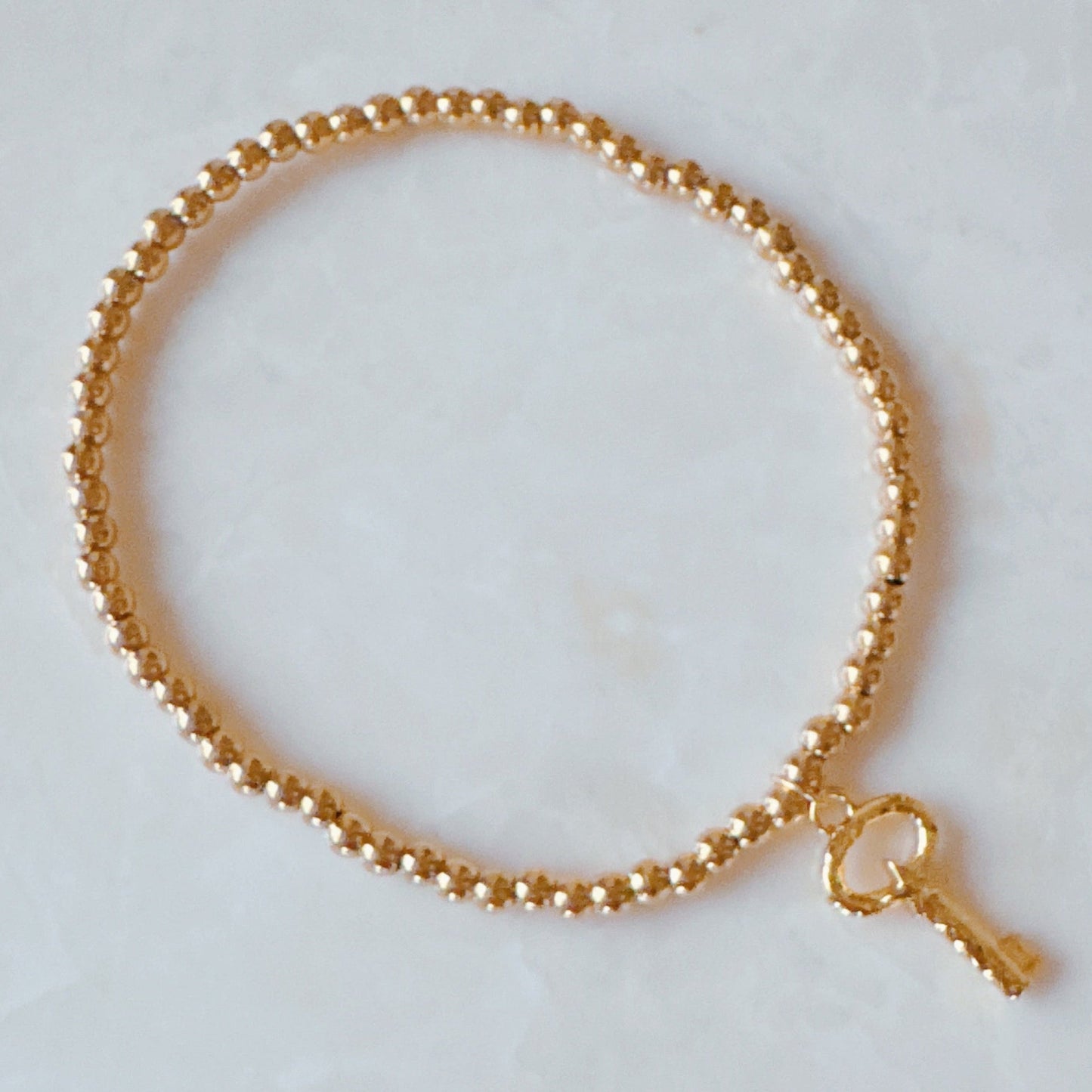Golden Ball Single Charm Stretch Bracelet