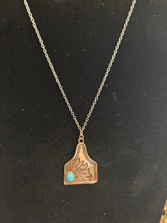 Turquoise flower cow tag