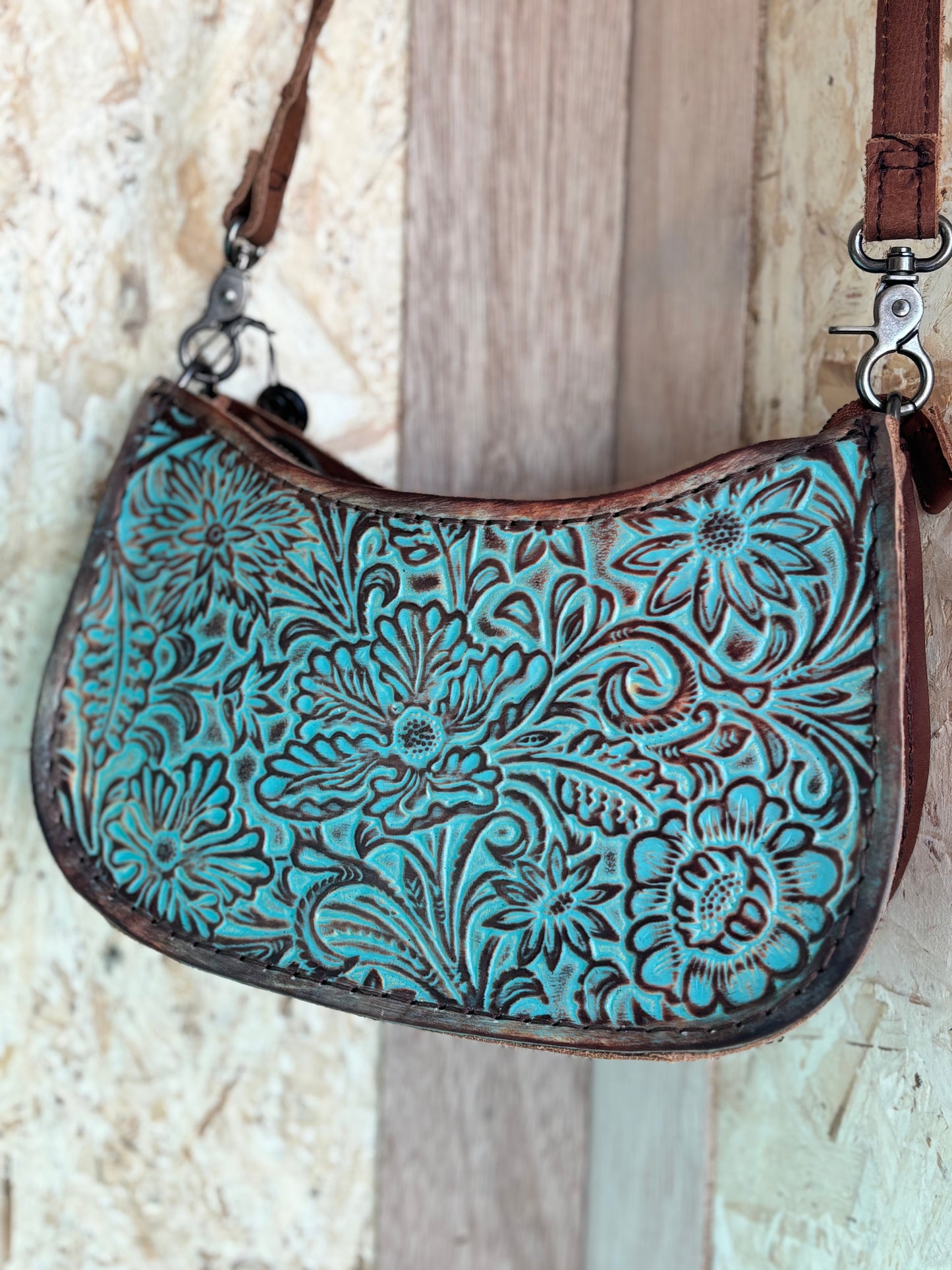 Teal tooled printed leather crossbody