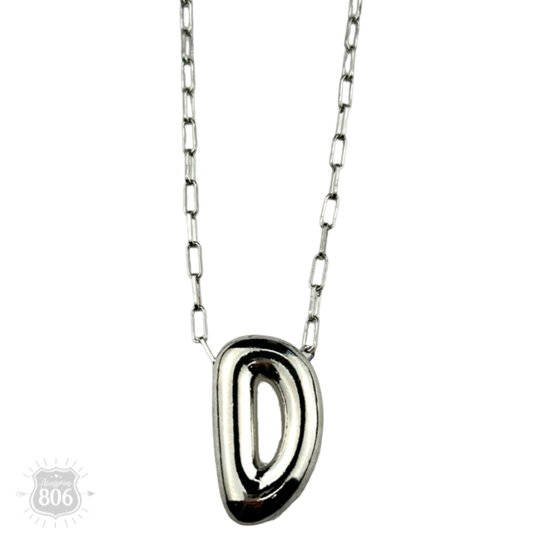Silver letter pendant on necklace, initial monogram
