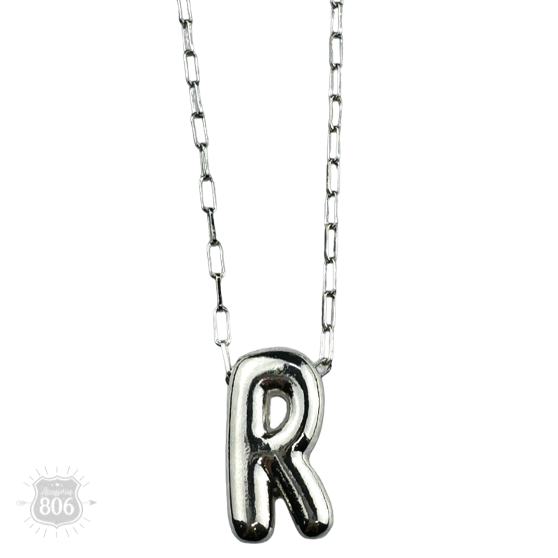 Silver letter pendant on necklace, initial monogram