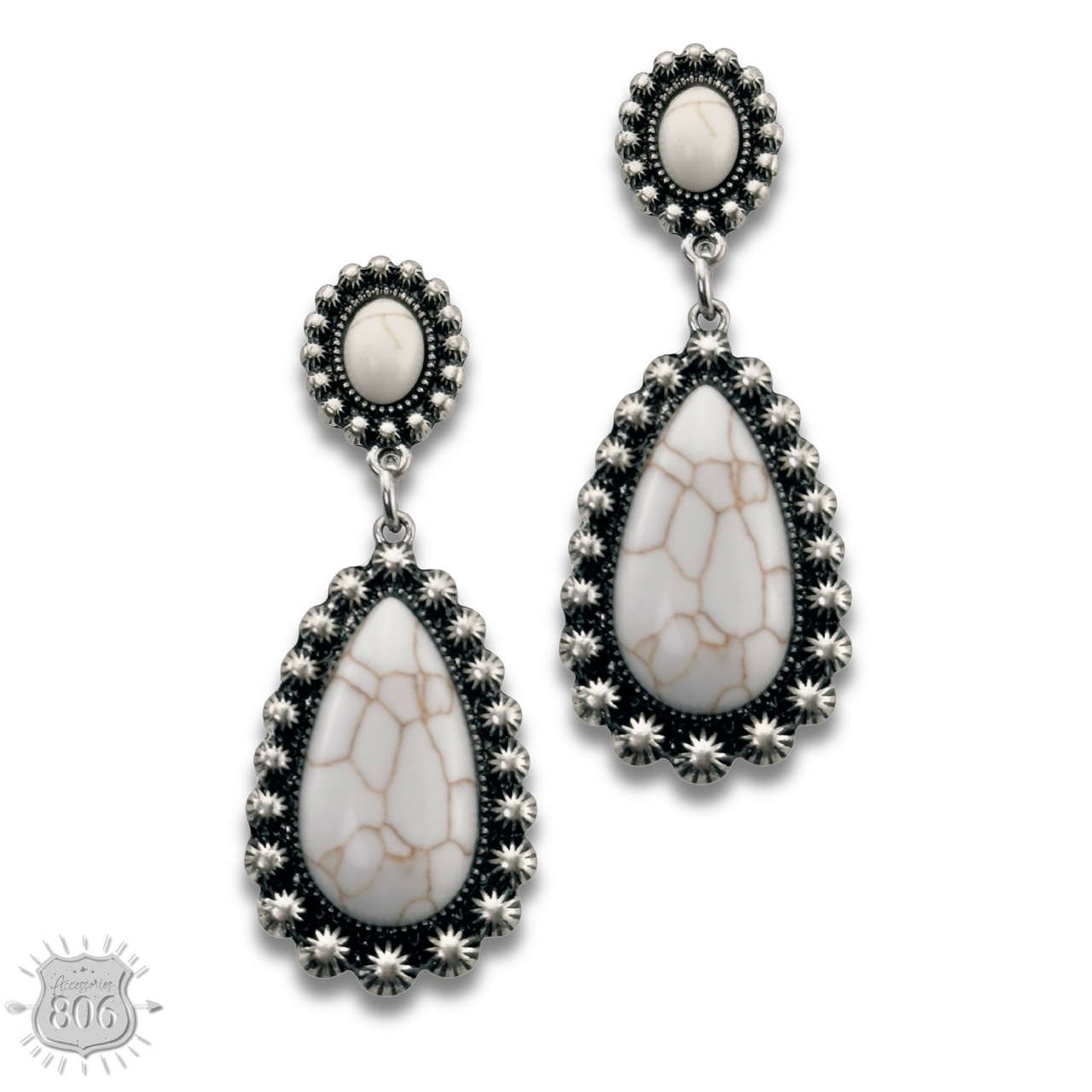 Stone teardrop in silver setting earring