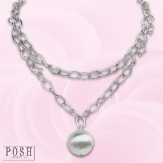 Double strand necklace with ball pendant